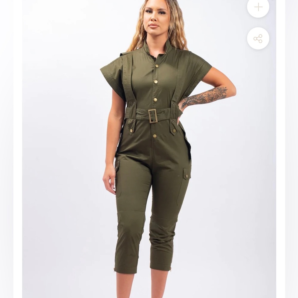 Belted, mid leg length jump suit. Capped sleeves. Olive green